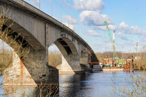 Start of construction of a new bridge over the river. Stock Photos