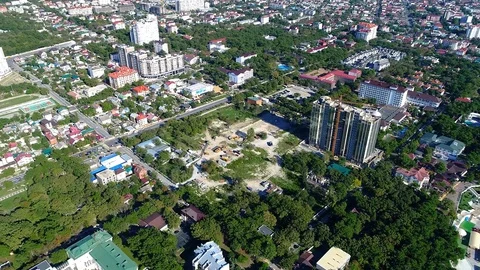 Start of construction of a residential complex on the sea coast. Construction Stock Footage 128437013