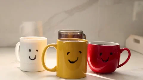 Start the Day With Coffee Smiles and Warm Mugs on the Table in the Morning Light Stock Footage 327767134