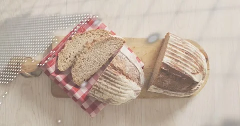 At start, dot map overlaying artisanal loaf pulsing, scrolling code visualizing Stock Footage 317834658
