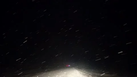 Start Driving Through The Winter Forest On Snowy Road At Night. Stock Footage 146873337