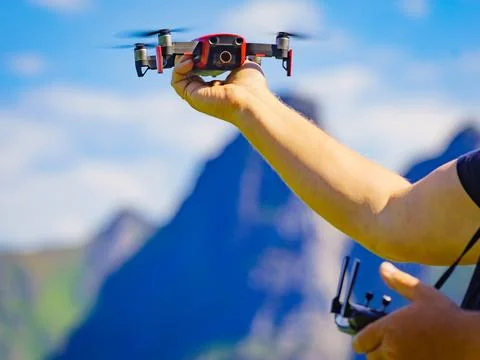 Start the drone, launching from hand Stock Photos