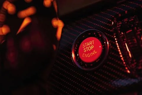 Start engine button dark Start engine button in the dark at night Start en... Stock Photos