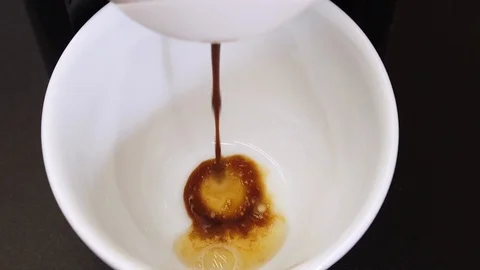 Start of espresso coffee brewing Stock Footage 127362671