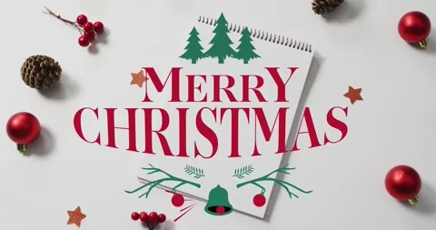 On start flat-lay notepad greeting forming as trees sliding, bell swinging by Stock Footage 321889706