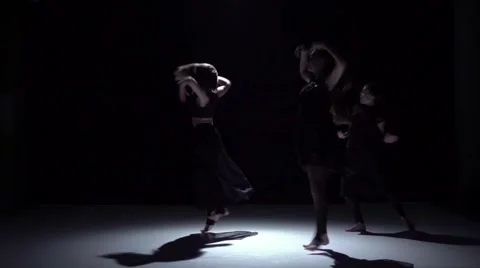 Start graceful contemporary dance of three dancers on black, shadow, slow motion Stock Footage 61179298