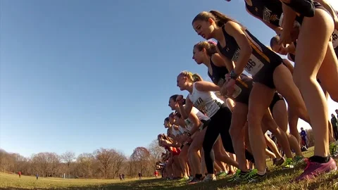 START - LOW ANGLE START OF GIRLS CROSS COUNTRY Video stock 170388465