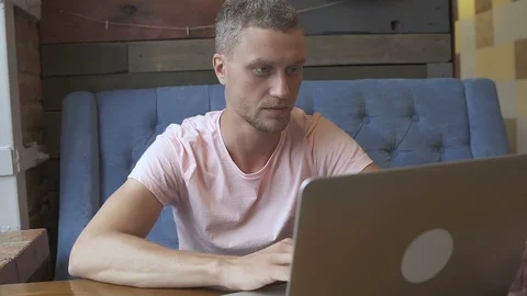 Start up. Man working at laptop computer Stock Footage 95218014