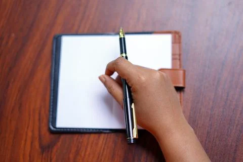 Before start noted down on notebook. image Stock Photos