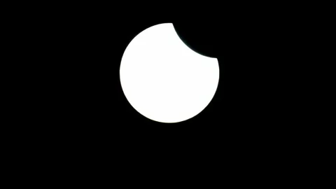 Start phase solar eclipse .gentle camera. static shoot. tight details Stock Footage 135710688