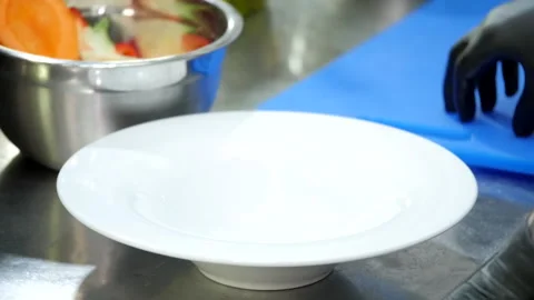 Start Serving a Plate with a Dish Stock Footage 131629231