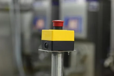Start - stop button on industrial device in plant Stock Photos