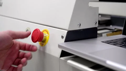 Start stop buttons. The man is pushing buttons. Industrial equipment setup. Stock Footage 296109182