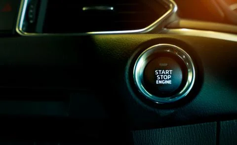 Start stop engine button of luxury car. Push up button for start or stop car  Foto stock