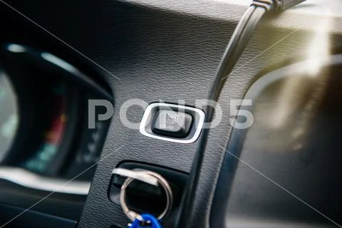 Start stop engine button on modern car dashboard Stock Image #110941006