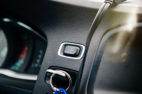 Start stop engine button on modern car dashboard Foto stock