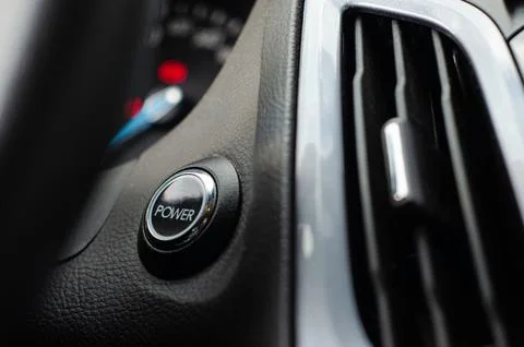 Start stop engine button on a modern car dashboard Foto stock