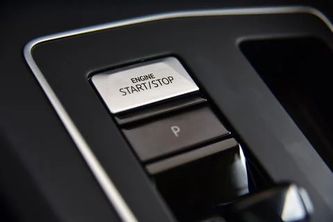 Start stop engine button on a modern car dashboard Stock Photos