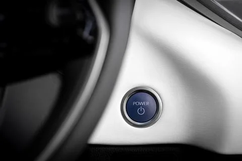 Start stop engine modern new car button, close up Stock Photos