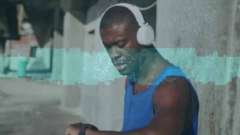 Start text banner against african american fit man using smartwatch outdoors Stock Footage 327645431