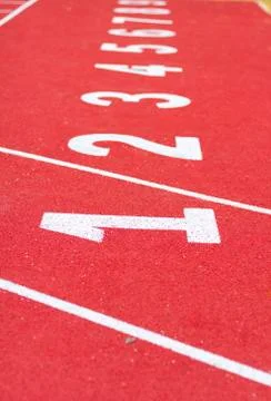 Start track. line on a red running track Stock Photos