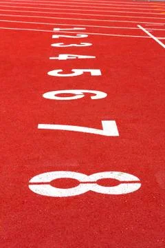 Start track. line on a red running track Stock Photos