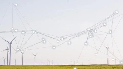 On start web forming above wind farm, nodes pulsing and linking, frame panning Stock Footage 333975873