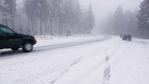 Start of winter. Car on snow-covered road Stock-Footage 82788016