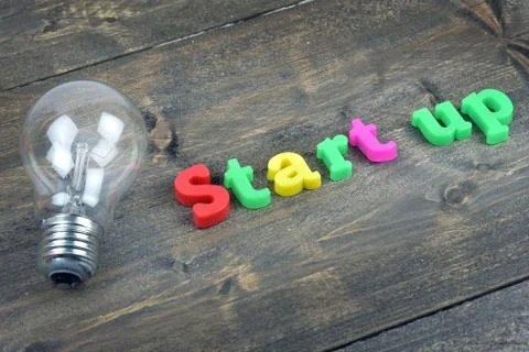 Start up on wooden table Foto stock