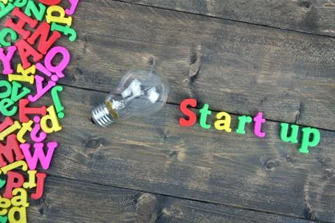 Start up on wooden table Stock-Fotos