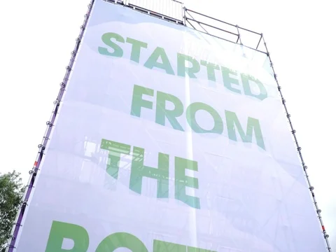 Started From The Bottom print sign on gantry tower 動画素材 78609784