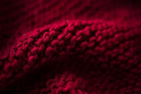 Started knitting on knitting needles, with yarn on a rustic wooden table, with Stock Photos