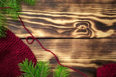 Started knitting on knitting needles, with yarn on a rustic wooden table, with Stock Photos