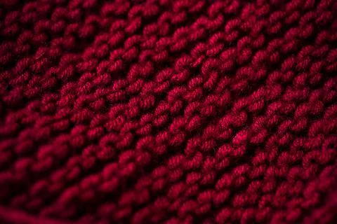 Started knitting on knitting needles, with yarn on a rustic wooden table, with Stock Photos