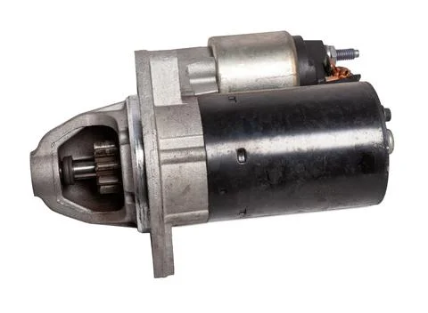 Starter of an internal combustion engine New Spare part for car on a white ba Fotos de archivo