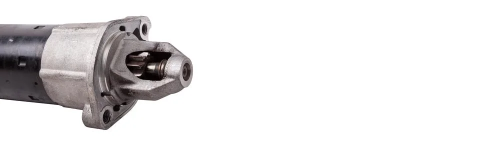 Starter of an internal combustion engine New Spare part for car on a white .. 스톡 사진