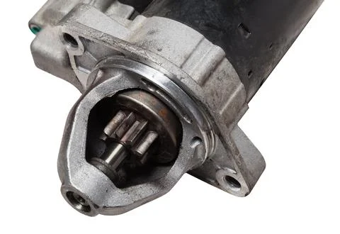 Starter of an internal combustion engine New Spare part for car on a white ba Stock Photos