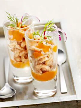 Starter of prawns with mouse served in a small glass Stock Photos