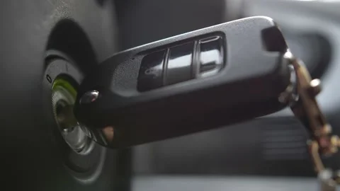 Starting and Stopping Car Engine with Ignition Key Close Up Stock Footage 142698617