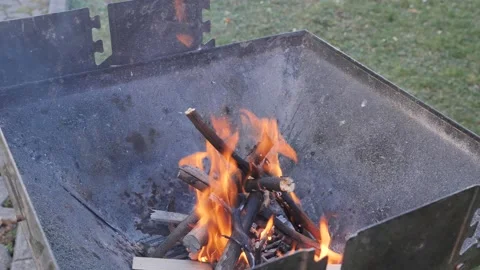 Starting a barbeque fire in closeup Stock Footage 171686492