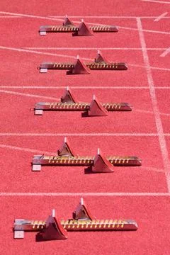 Starting blocks Stock Photos