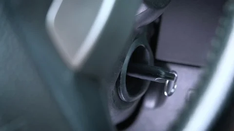 Starting car engine. a man's hand drives a car key. Stock Footage
