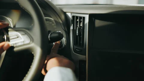 Starting car engine. Track in to the button. Finger press the button to start Stock Footage 174769952