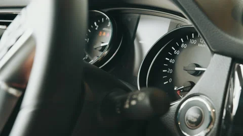 Starting car engine. Track in to the button. Finger press the button to start Stock Footage 176385689