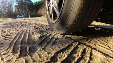 Starting Car Tyre Spinning Quickly Throwing Dirt Into Camera Slow Motion Stock Footage 144529831