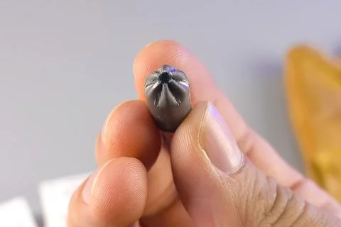 Starting construction chuck in a mans hand Stock Photos