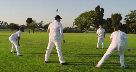 Starting drill with ball toss, diverse male team rotating diving bowling and Stock Footage 341931575
