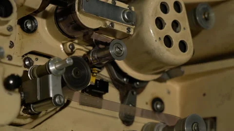 Starting up the film machine, in which the rollers start spinning Stock Footage 149295408