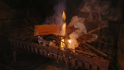Starting a fire in a fireplace. Stock Footage 199236718