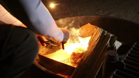 Starting a Fire with Flint Type Starter and Fire Burning Stock Footage 63010606